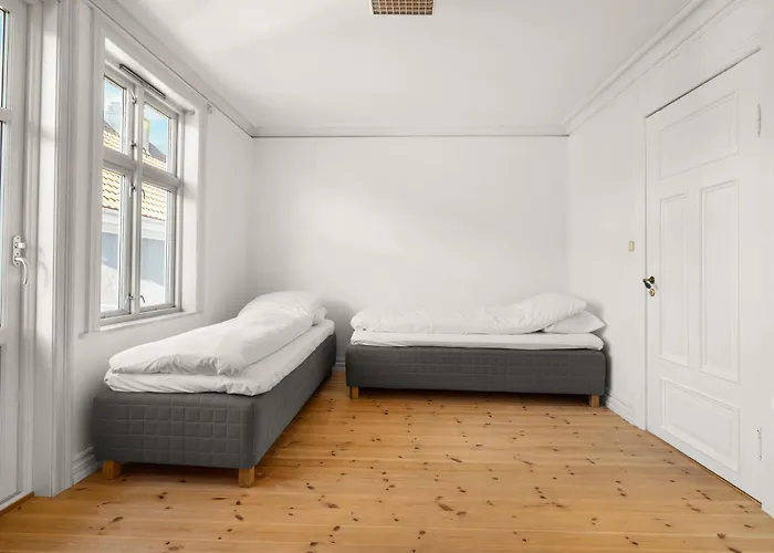 Апартаменты Bryggen Historical Townhouse I Rooftop Views! Берген